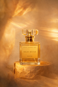 Aromatic Solar Nectar perfume bottle by Astraea Fragrance Haus with a sleek design and golden accents.