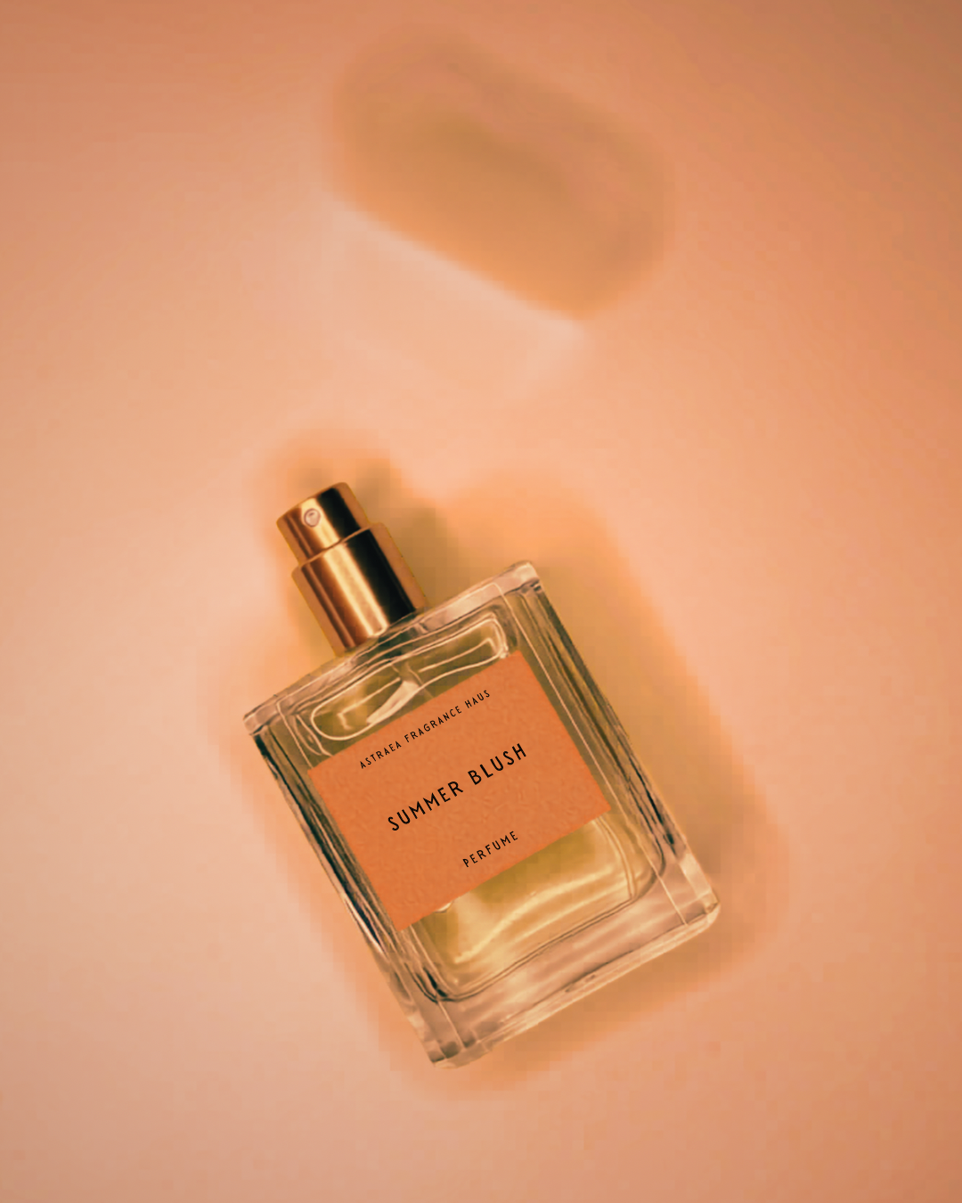 Asterae Summer Blush perfume bottle with a soft pink label and floral design, showcasing the Astraea Fragrance Haus brand.