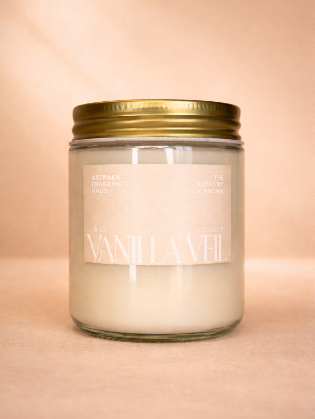 A vanilla scented perfume bottle named Vanilla Veil by Astraea Fragrance Haus, with elegant packaging and a soft, creamy appearance.
