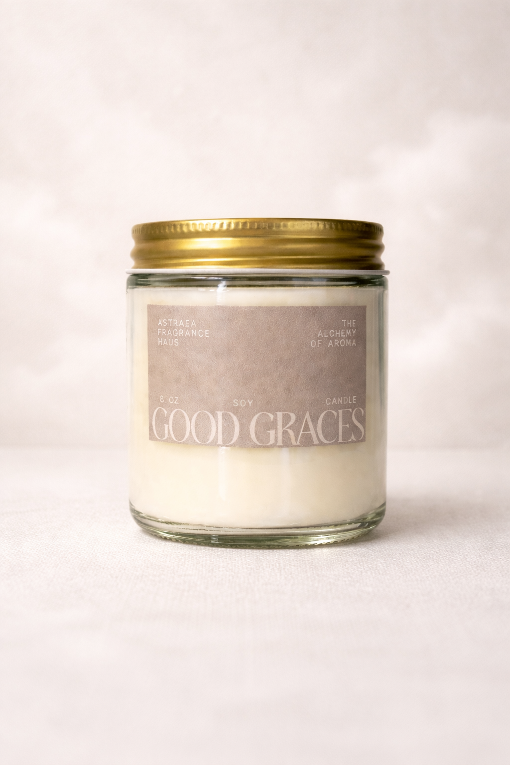 Aromatic Good Graces fragrance bottle by Astraea Fragrance Haus on a neutral background.