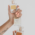 Summer Blush perfume by Astraea Fragrance Haus, elegant glass bottle with blush pink liquid and floral cap design.